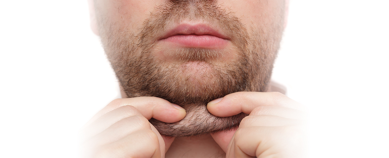 man pulling on chin fat